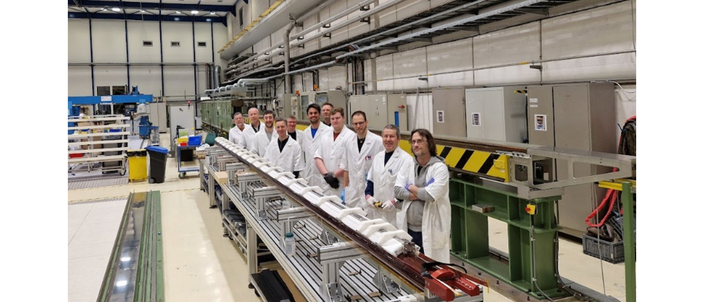 people in white lab coats with equipment
